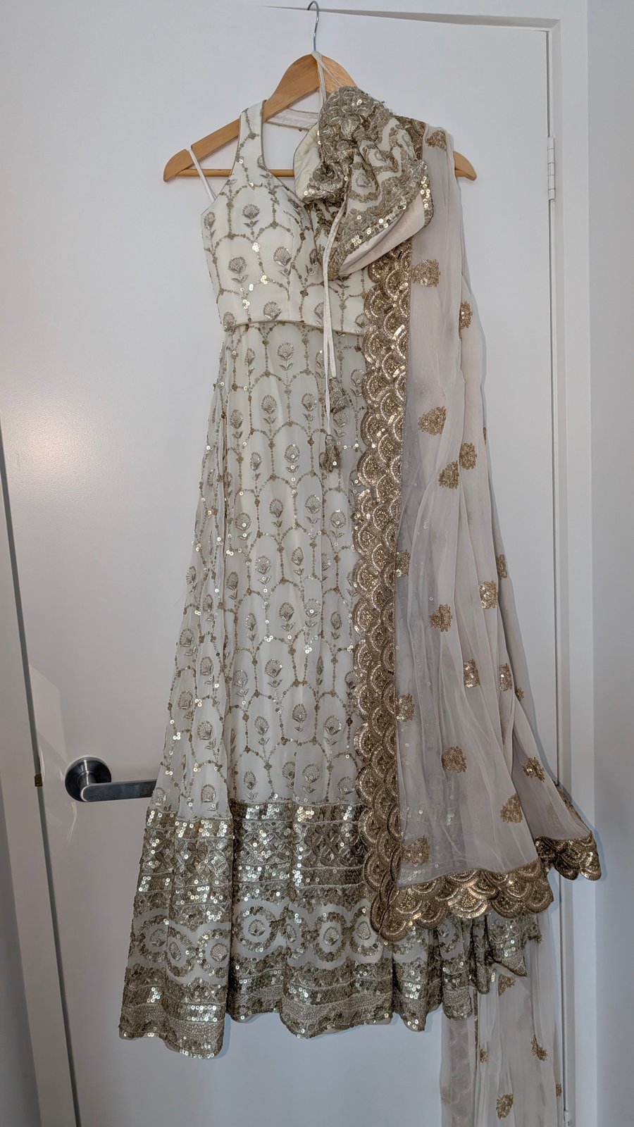 White and antique gold lehenga